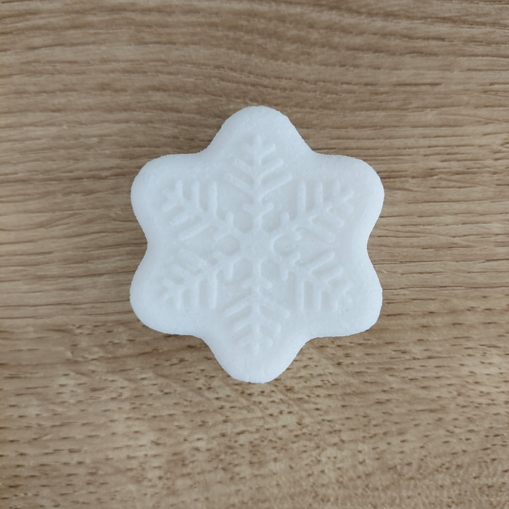 This shows the unpainted Snowflake bathbomb as it comes out of the mould, and it is ready for painting.
